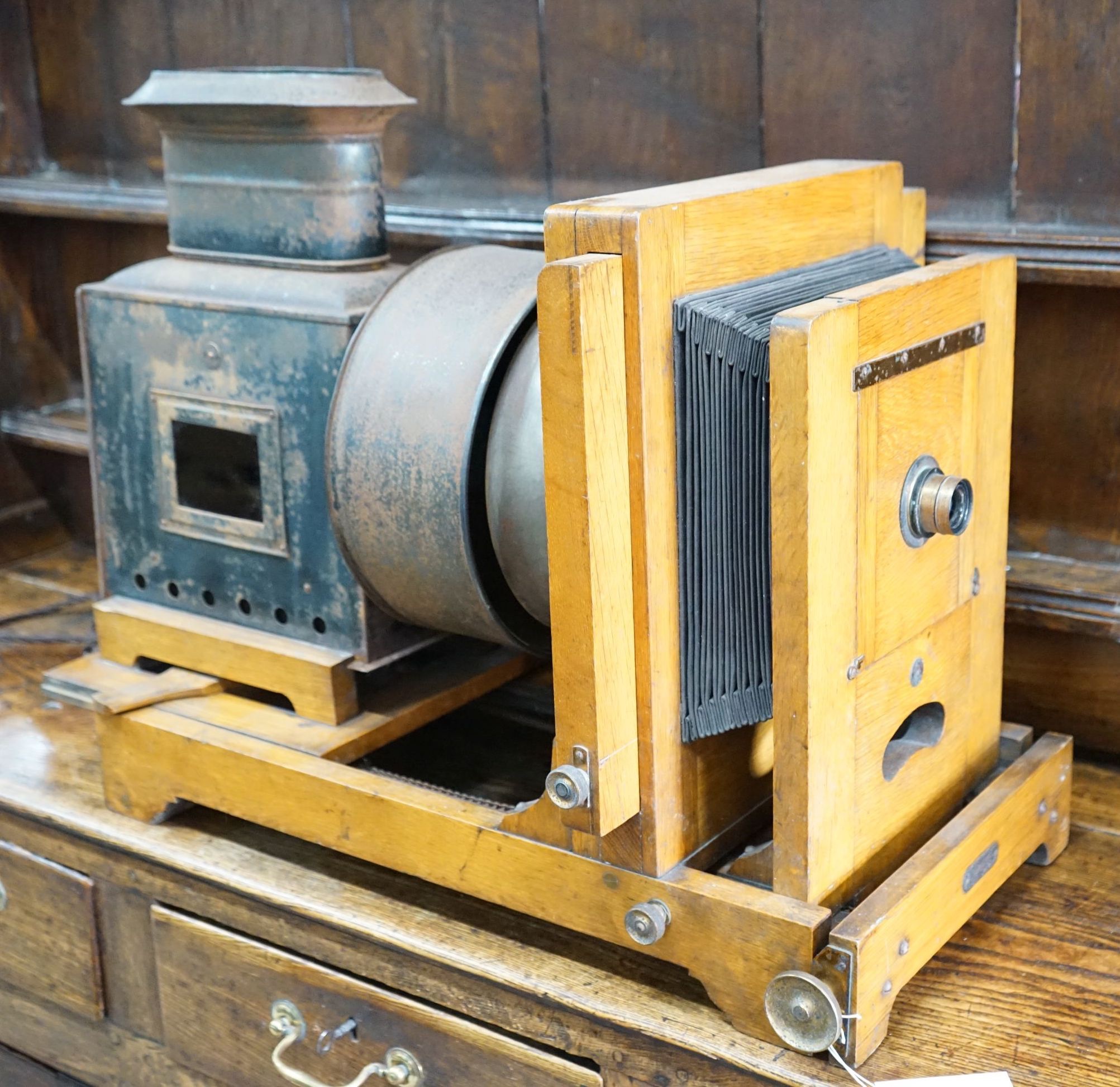 A Victorian oak magic lantern converted to electricity